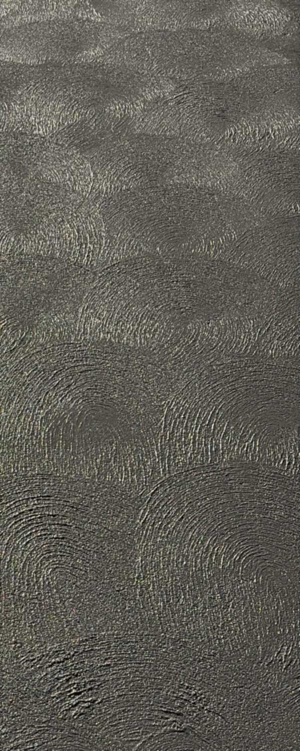 Close-up of a driveway coating with a hand-applied swirl texture